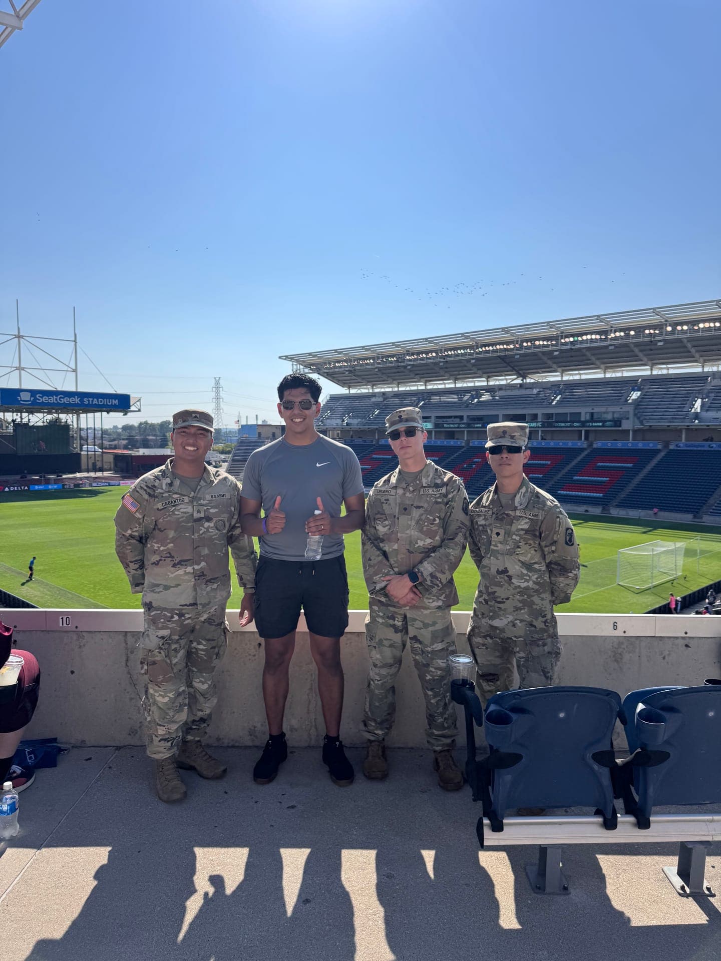 Esprit de Corps Foundation with active-duty service members at Chicago Stars veteran appreciation event